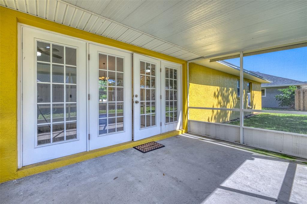26 Marjorie Trail Ormond Beach, FL 32174 - Photo 24 of 30 a view of an empty room with a sliding door