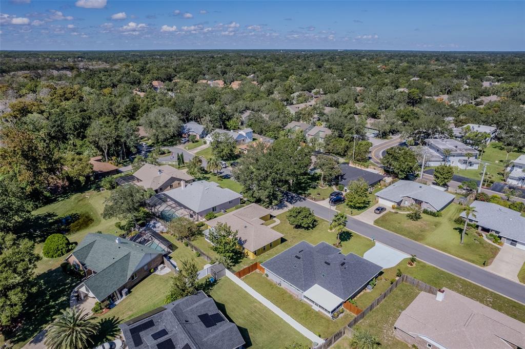 26 Marjorie Trail Ormond Beach, FL 32174 - Photo 29 of 30 an aerial view of residential houses with outdoor space and trees