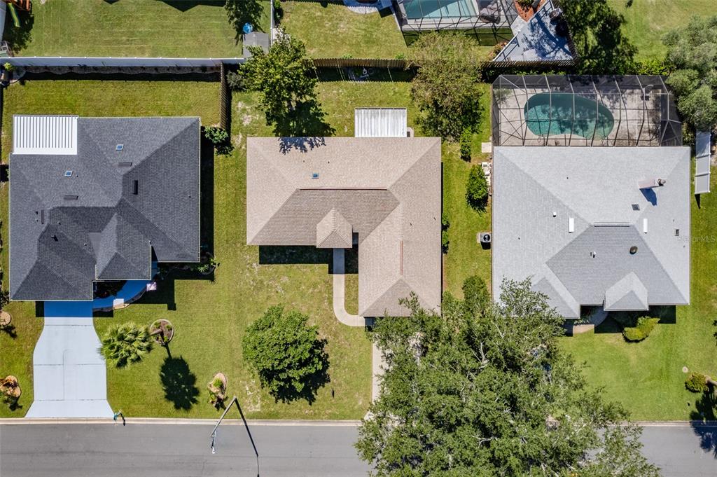 26 Marjorie Trail Ormond Beach, FL 32174 - Photo 30 of 30 an aerial view of multiple houses with a yard