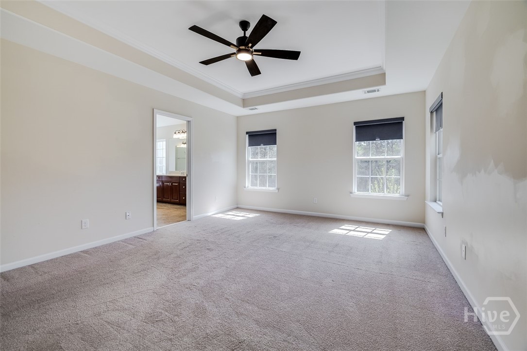 411 Plantation Place Rincon, GA 31326 - Photo 20 of 38 Primary bedroom with spa like bath and amazing closet.