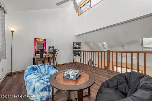 a living room with furniture and window