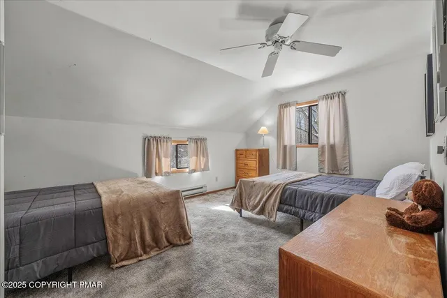 a view of a house with backyard porch and sitting area