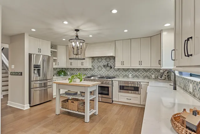 a kitchen with a stove and cabinets