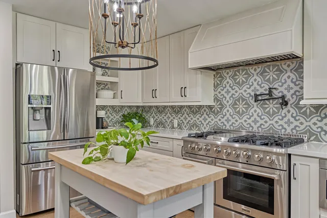 a view of a kitchen and dining table