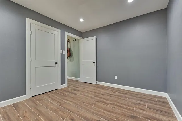 a bathroom with a granite countertop sink mirror and