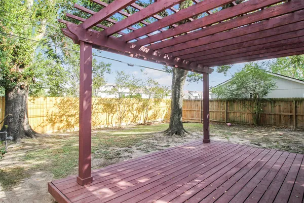 a house view with a backyard space
