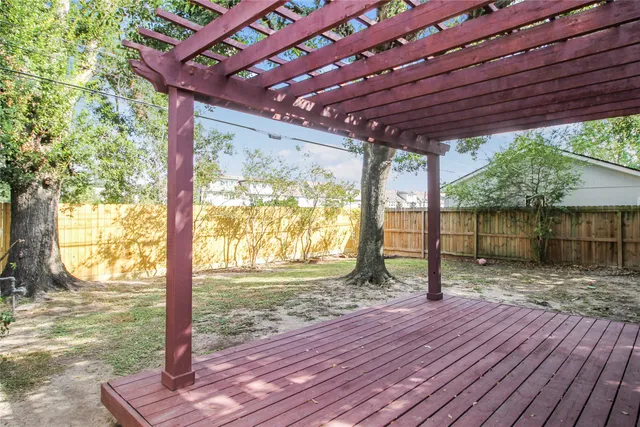 a house view with a backyard space