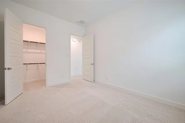 an empty room with an entryway