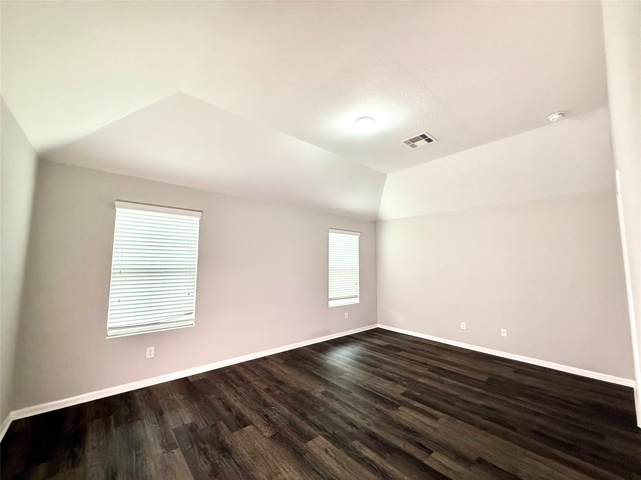 10646 Chestnut Path Way Tomball, TX 77375 - Photo 11 of 22 an empty room with wooden floor and windows