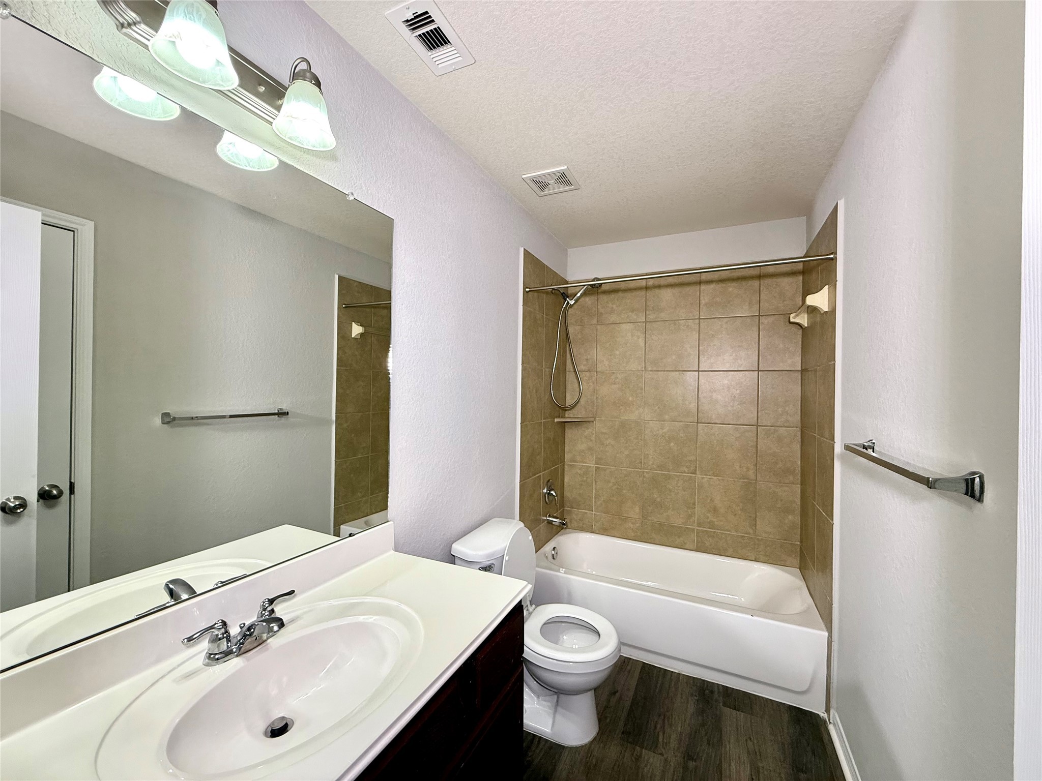 10646 Chestnut Path Way Tomball, TX 77375 - Photo 19 of 22 a bathroom with a sink a toilet and shower