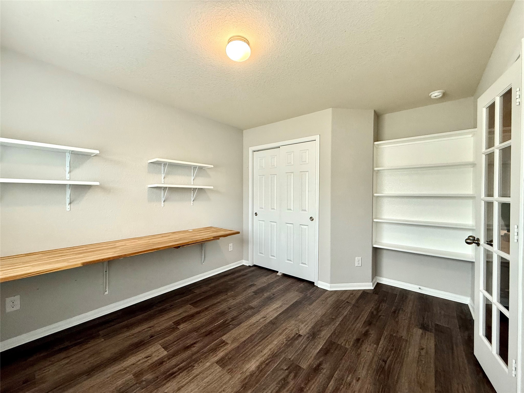 10646 Chestnut Path Way Tomball, TX 77375 - Photo 2 of 22 a view of walk in closet with empty racks