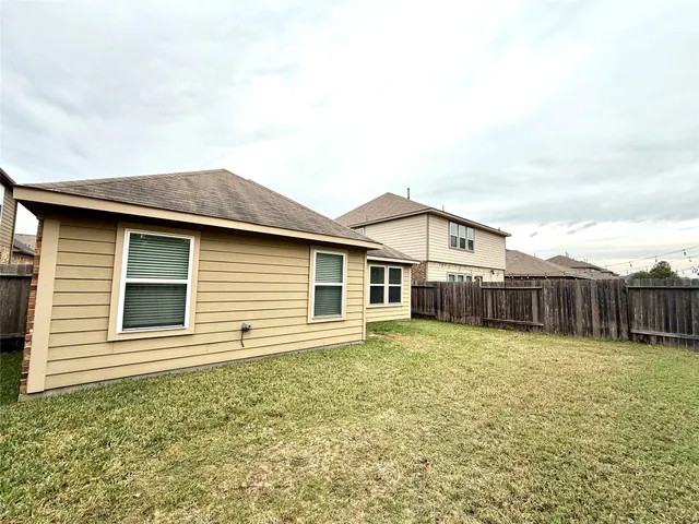 a house view with a garden space