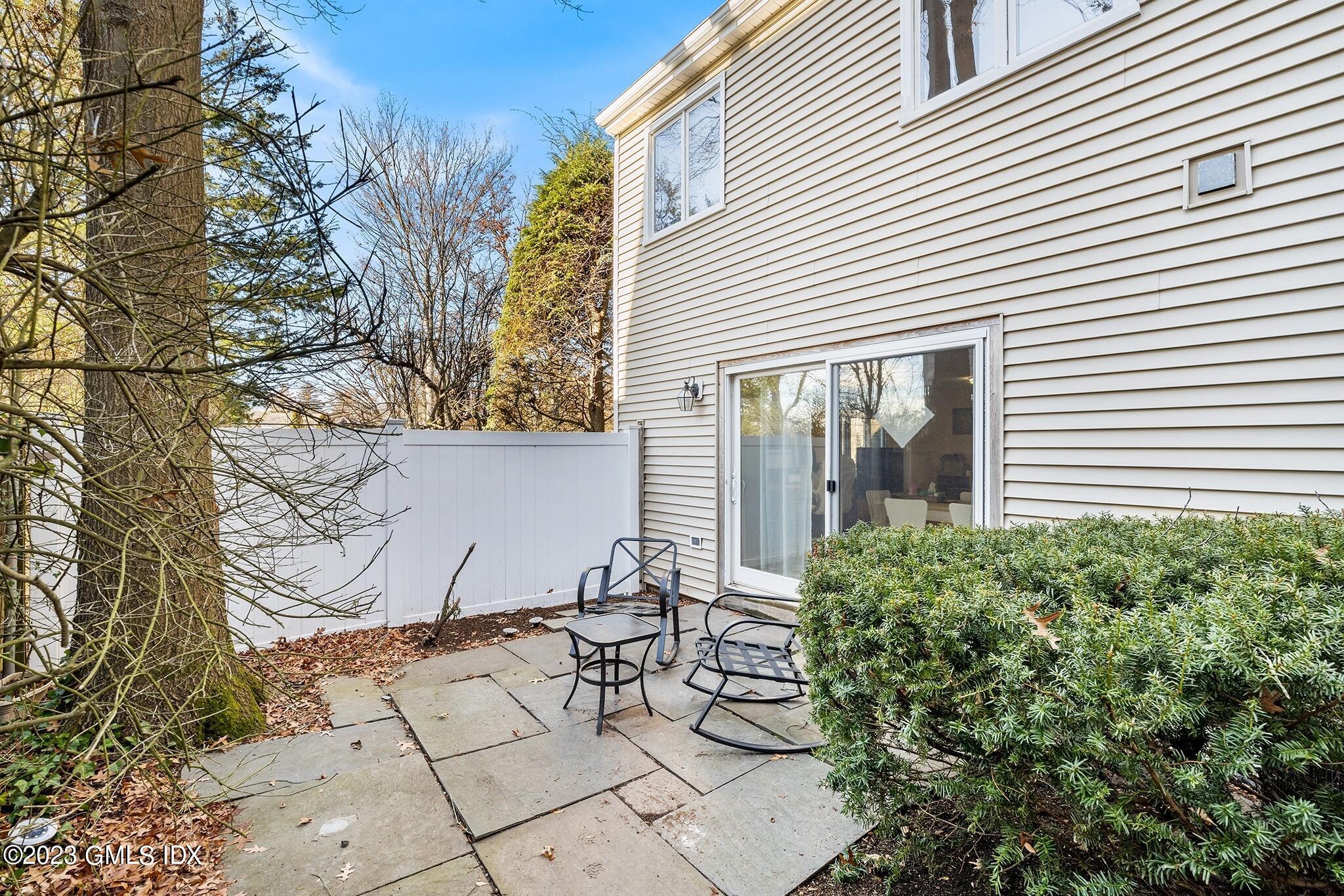 53 Bible Street, Unit 1 Cos Cob, CT 06807 - Photo 11 of 14 a view of a house with a backyard