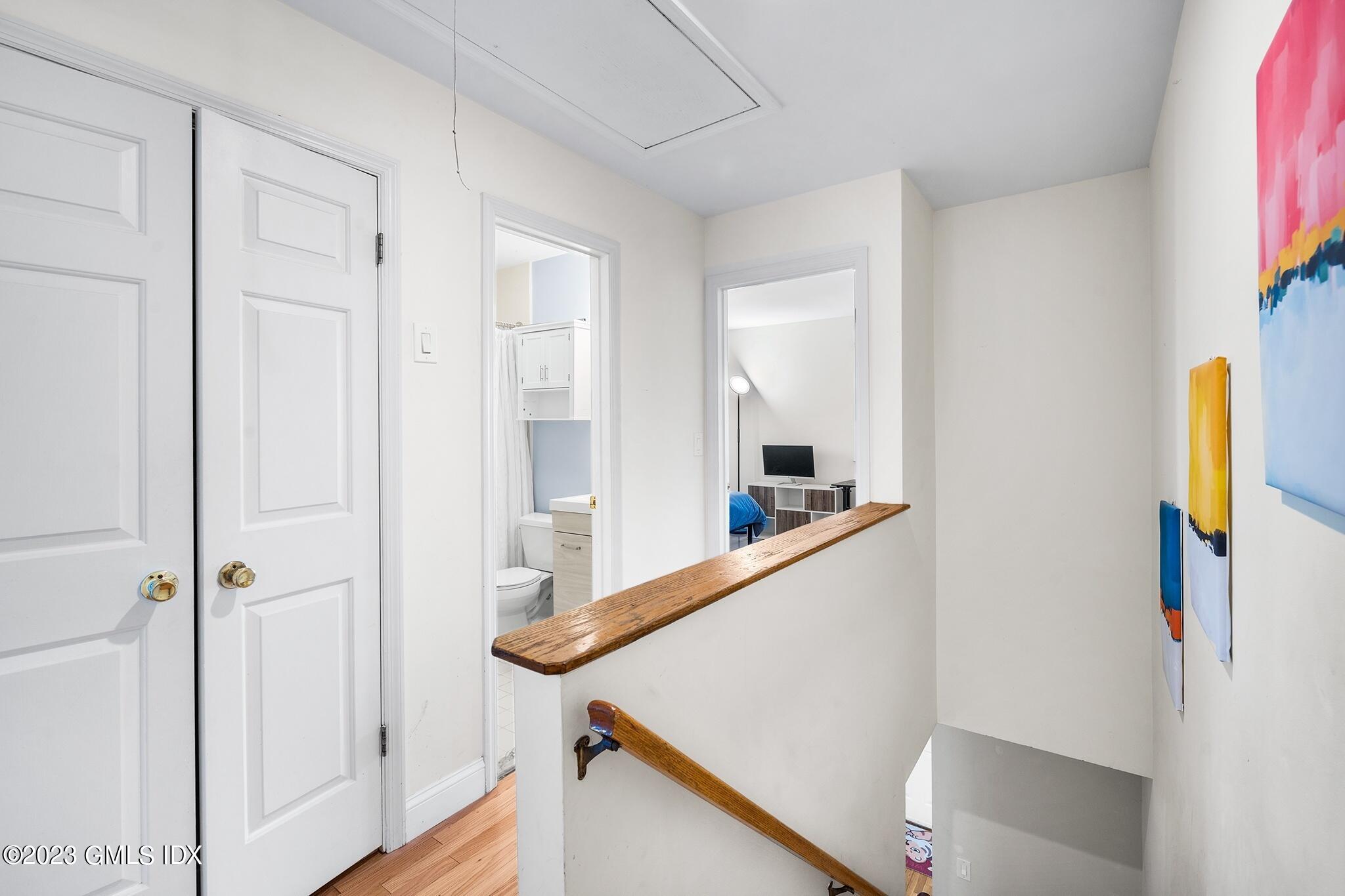 53 Bible Street, Unit 1 Cos Cob, CT 06807 - Photo 8 of 14 a kitchen with a refrigerator and a window
