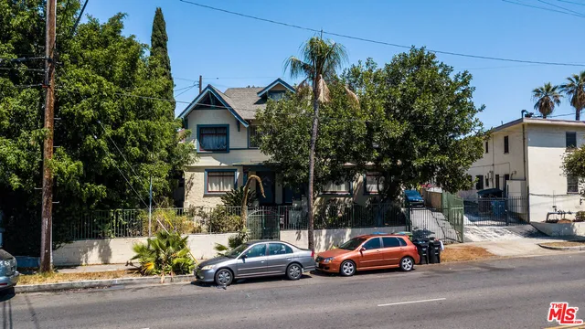 a car parked in front of a house