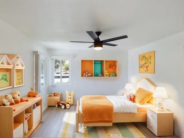 a bedroom with a bed and a couch