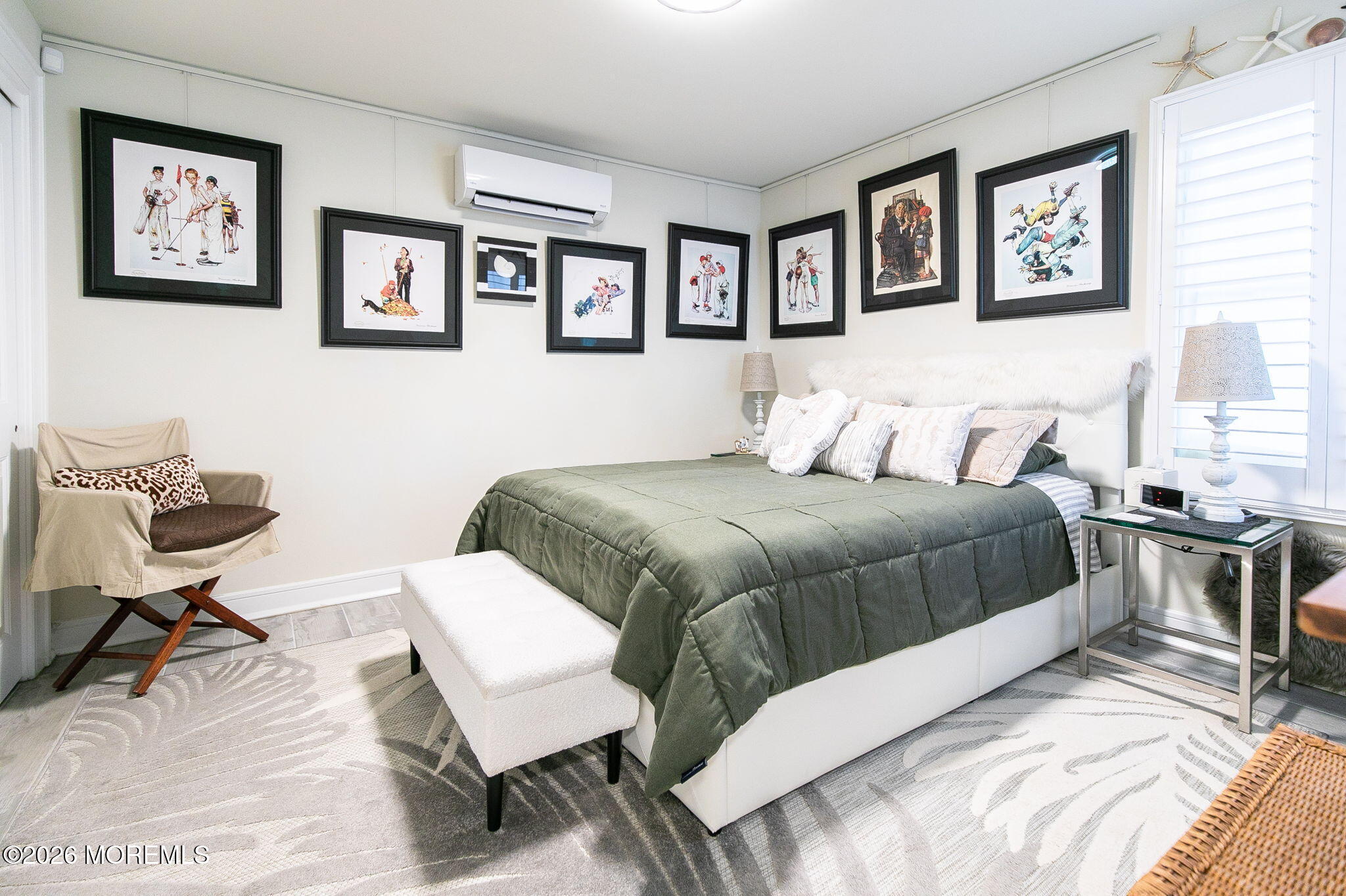 1301 Ocean Avenue, Unit 2 Point Pleasant Beach, NJ 08742 - Photo 18 of 31 a bedroom with a bed and wooden floor