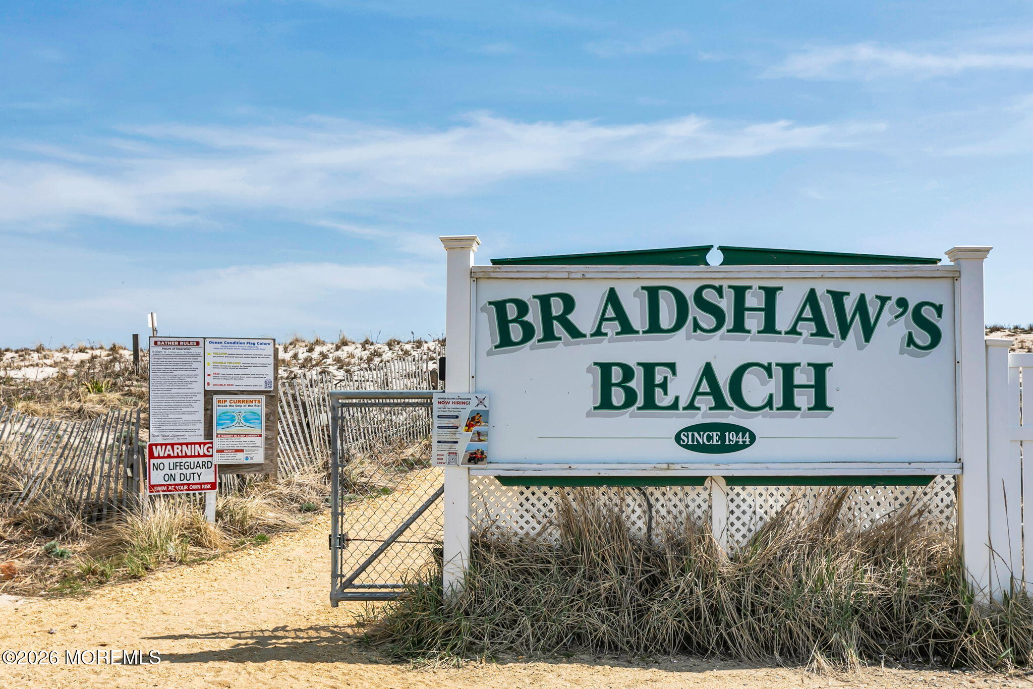 1301 Ocean Avenue, Unit 2 Point Pleasant Beach, NJ 08742 - Photo 29 of 31 a view of a sign board with buildings in background