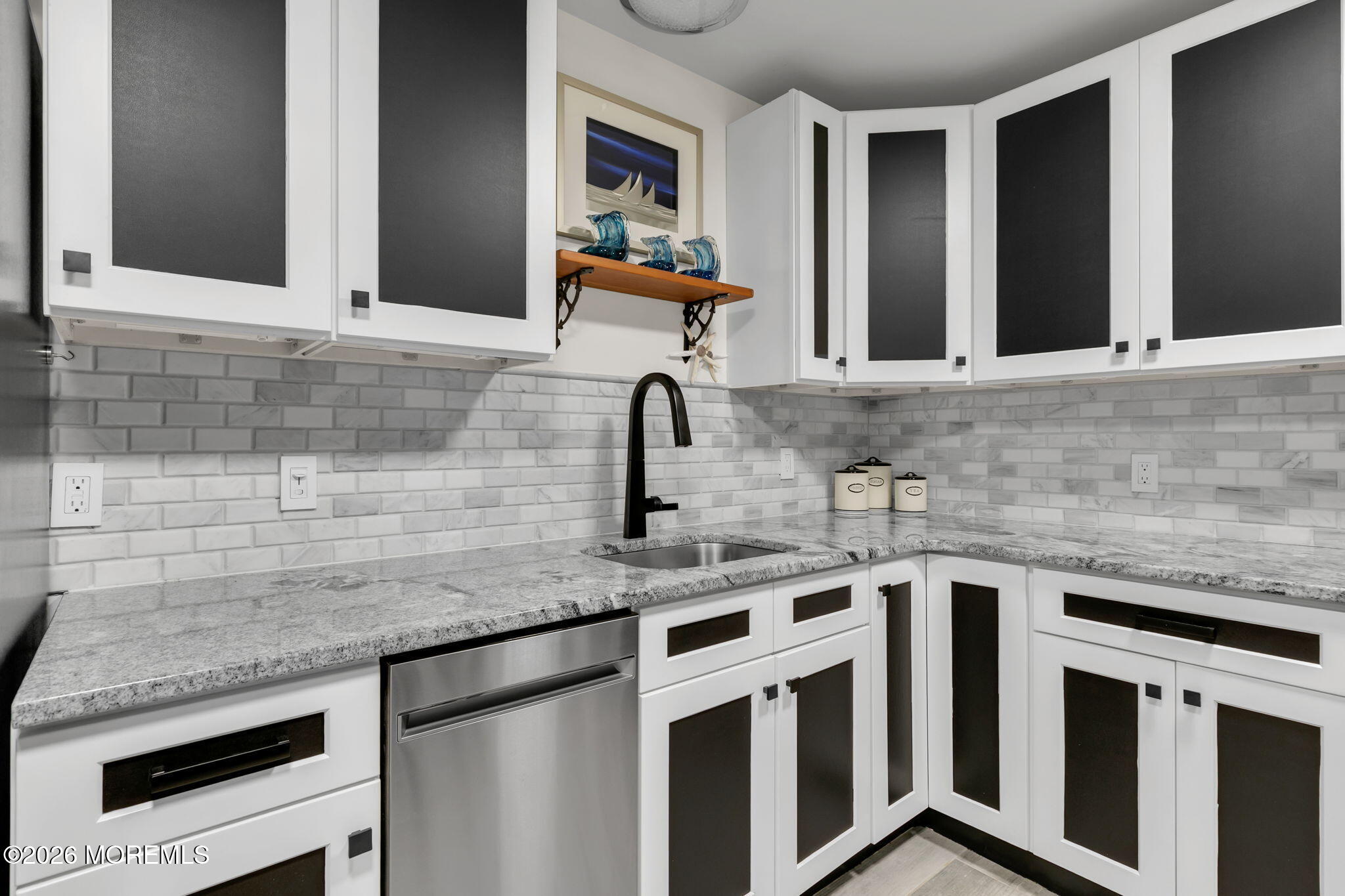 1301 Ocean Avenue, Unit 2 Point Pleasant Beach, NJ 08742 - Photo 10 of 31 a kitchen with stainless steel appliances granite countertop a sink and cabinets