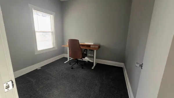 a view of a workspace with a window