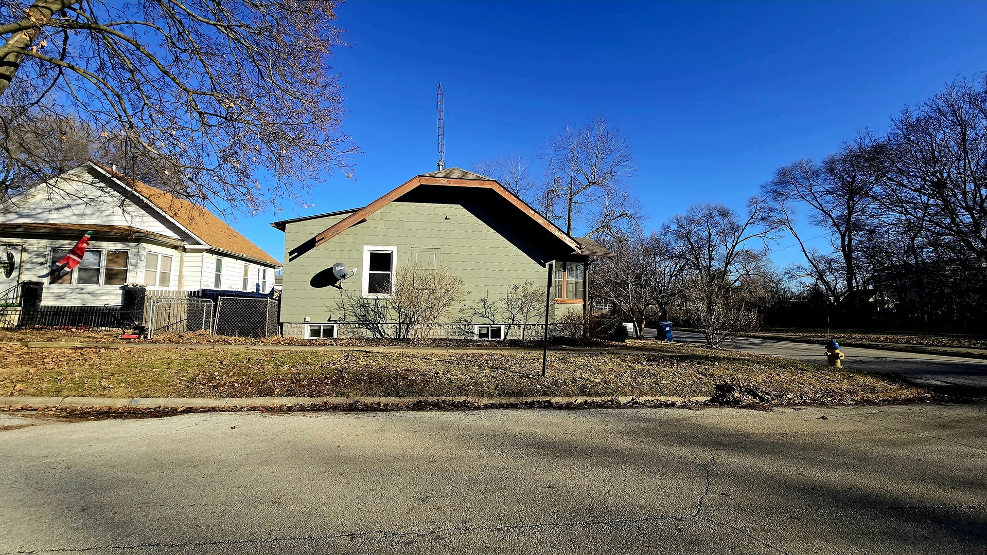 595 West Bridge Street Kankakee, IL 60901 - Photo 24 of 27 a front view of a house with a yard