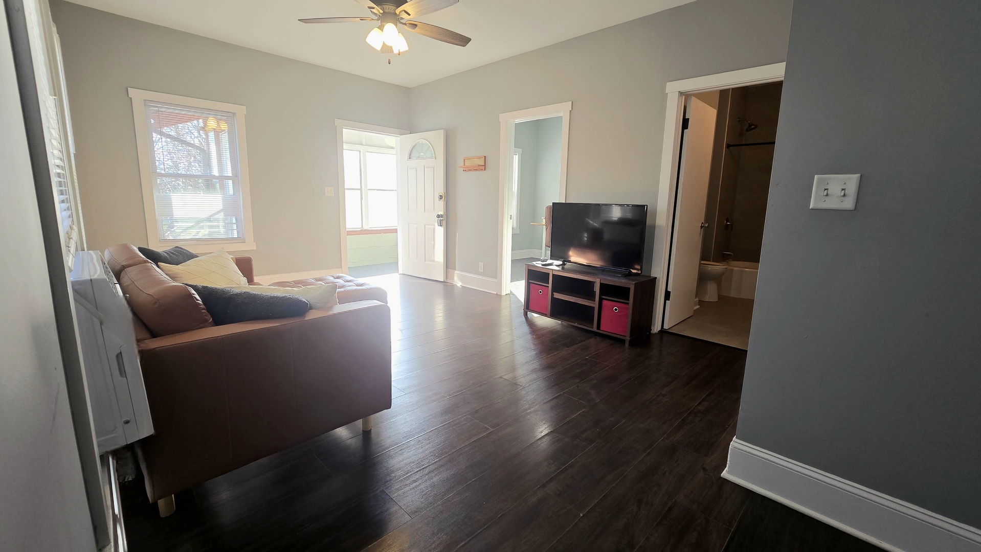 595 West Bridge Street Kankakee, IL 60901 - Photo 6 of 27 a living room with furniture and a flat screen tv
