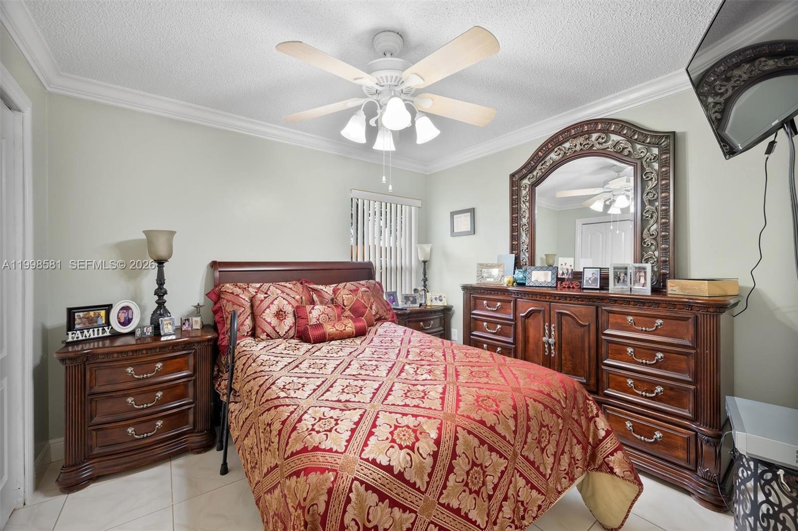 4218 Southwest 138th Court Miami, FL 33175 - Photo 24 of 24 a bedroom with a bed and a dresser