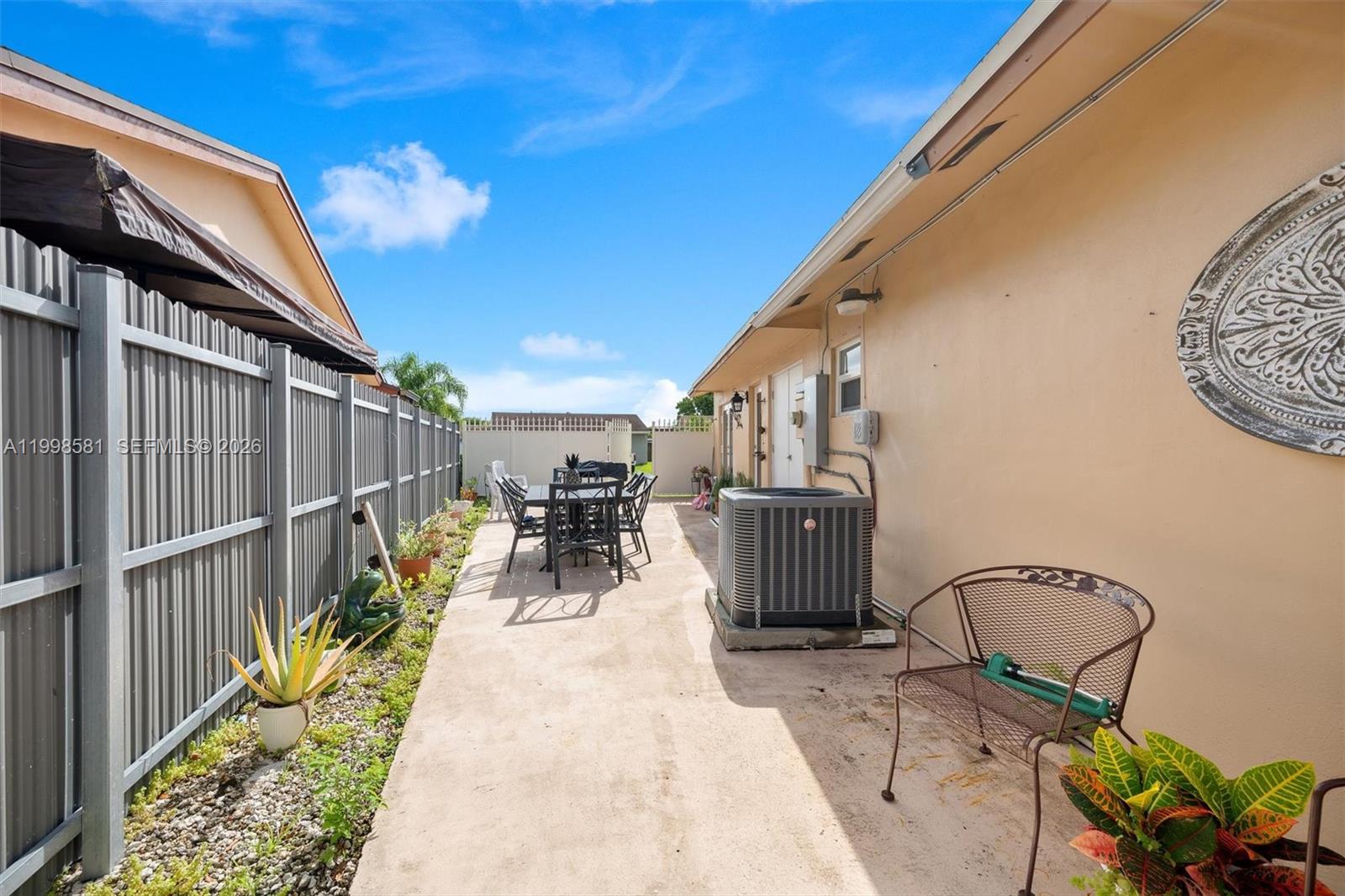 4218 Southwest 138th Court Miami, FL 33175 - Photo 5 of 24 a view of a chairs and tables in patio