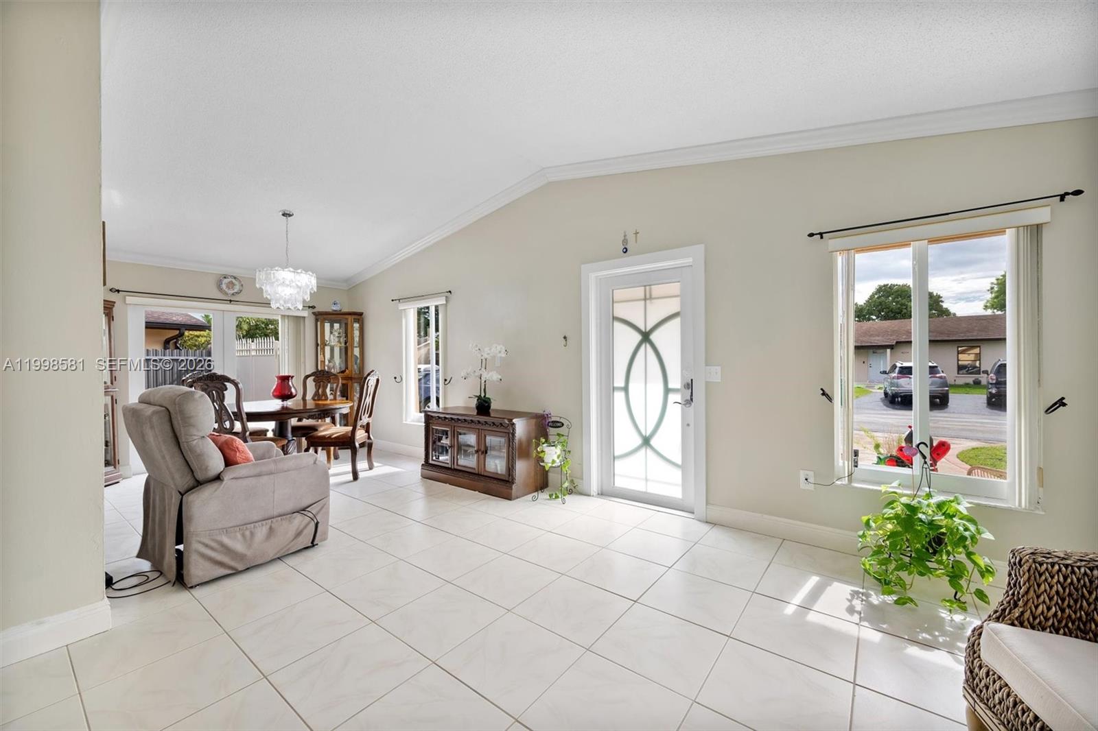 4218 Southwest 138th Court Miami, FL 33175 - Photo 10 of 24 a living room with furniture and a potted plant