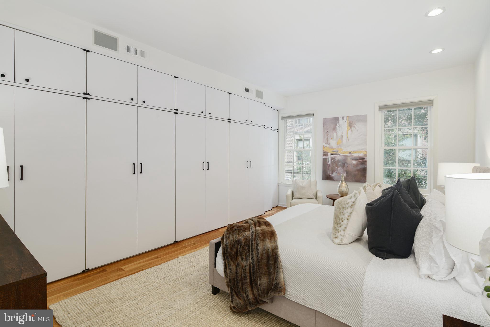 2028 Locust Street Philadelphia, PA 19103 - Photo 12 of 31 a bedroom with a bed and a window