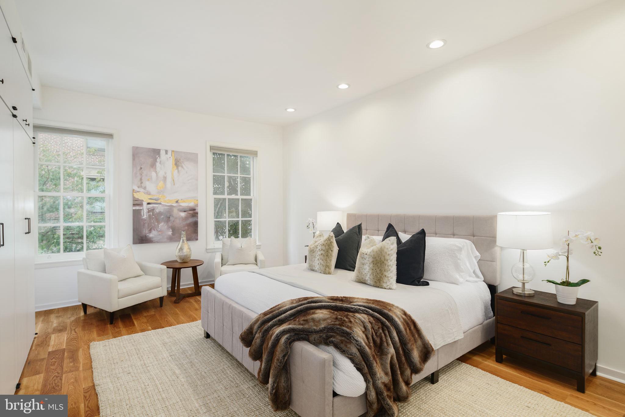 2028 Locust Street Philadelphia, PA 19103 - Photo 13 of 31 a bedroom with a bed and a couch