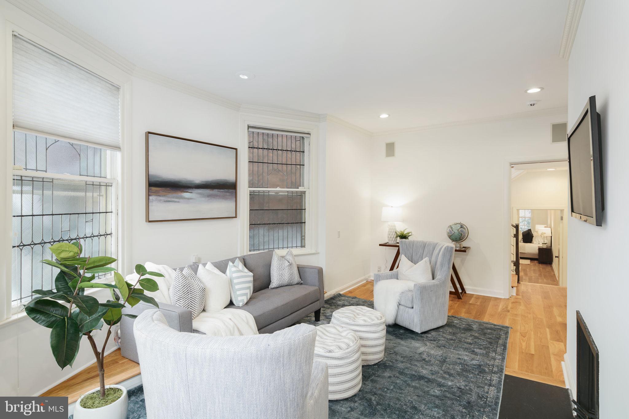 2028 Locust Street Philadelphia, PA 19103 - Photo 19 of 31 a living room with furniture