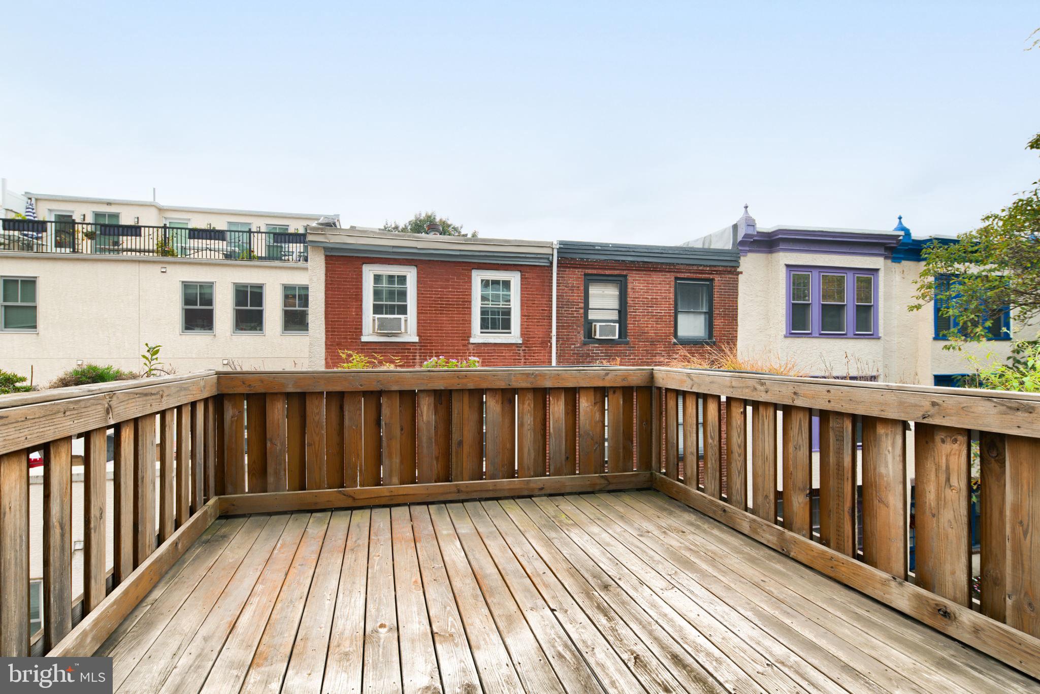 2028 Locust Street Philadelphia, PA 19103 - Photo 20 of 31 a view of a wooden roof deck
