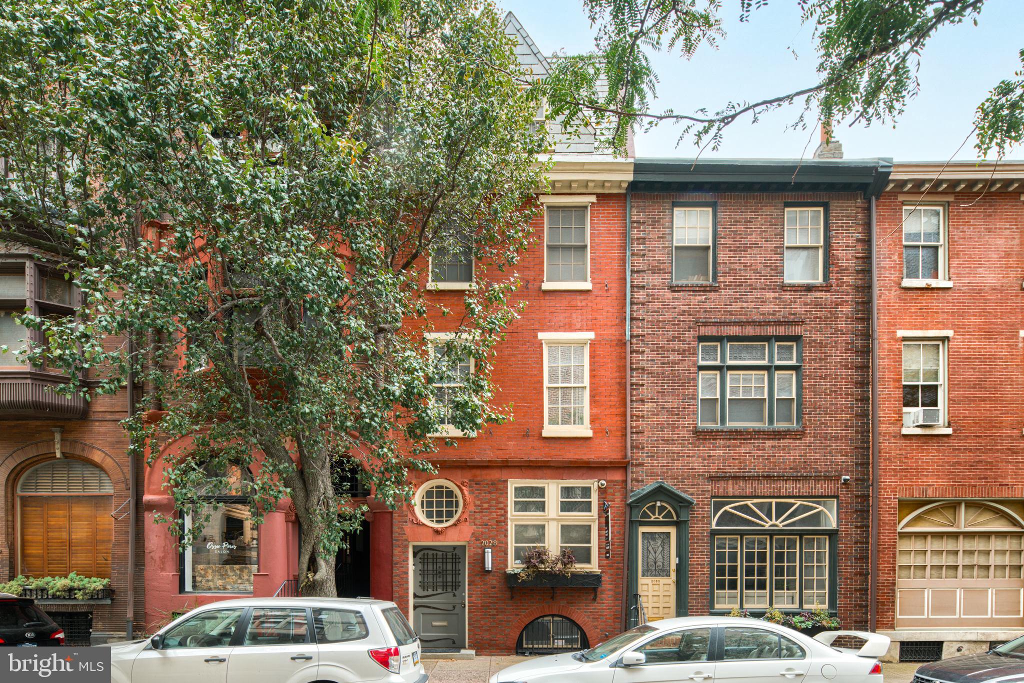 2028 Locust Street Philadelphia, PA 19103 - Photo 31 of 31 a front view of a brick building with many windows