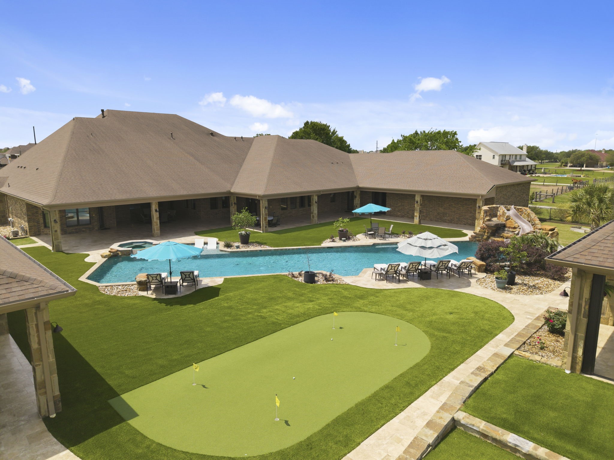 21620 Schiel Road Cypress, TX 77433 - Photo 36 of 49 Putting green is nestled beside the resort style pool
