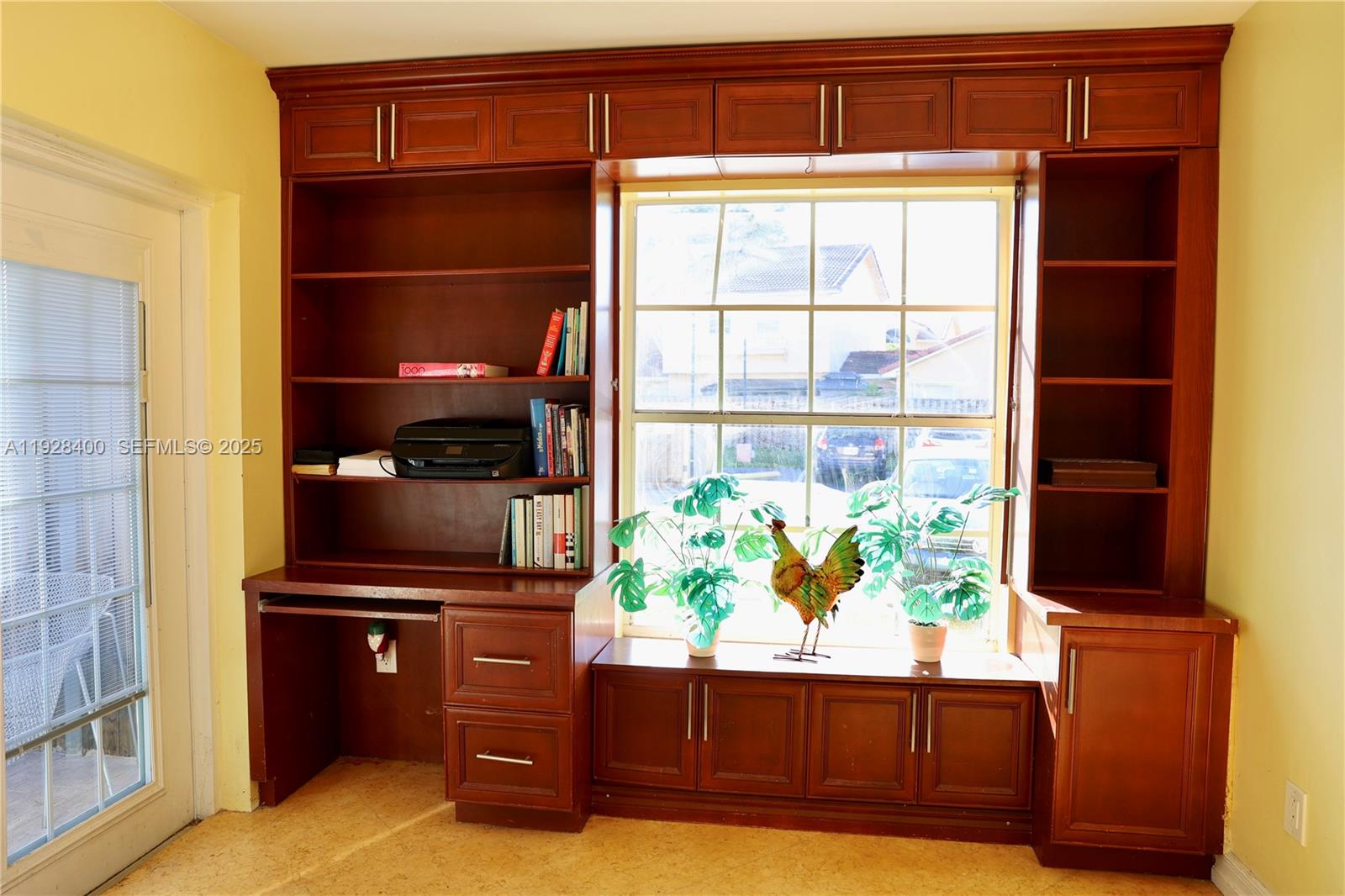 11049 Southwest 152nd Court Miami, FL 33196 - Photo 21 of 57 a kitchen with a refrigerator and a stove