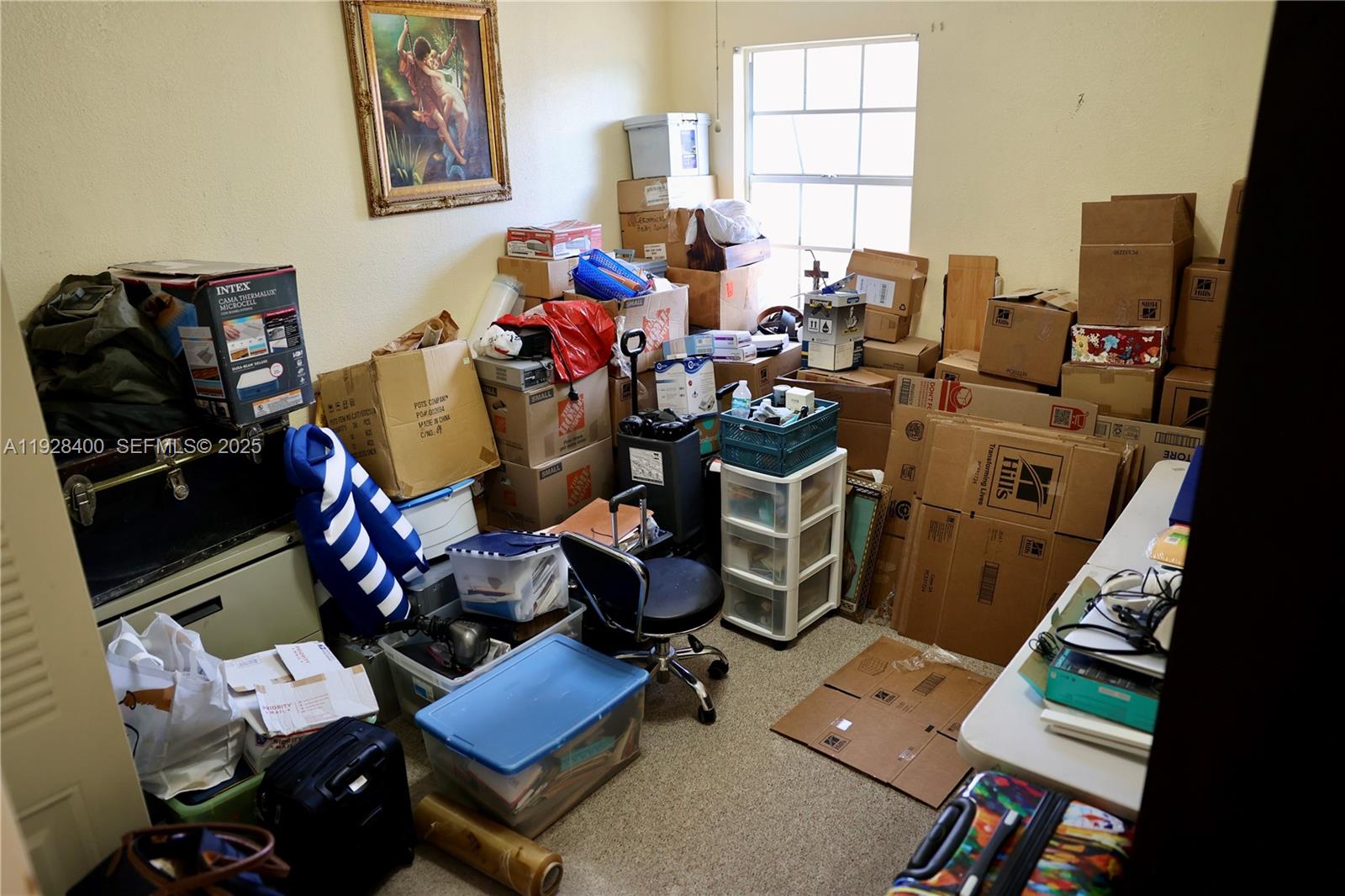 11049 Southwest 152nd Court Miami, FL 33196 - Photo 22 of 57 a room with furniture and a window