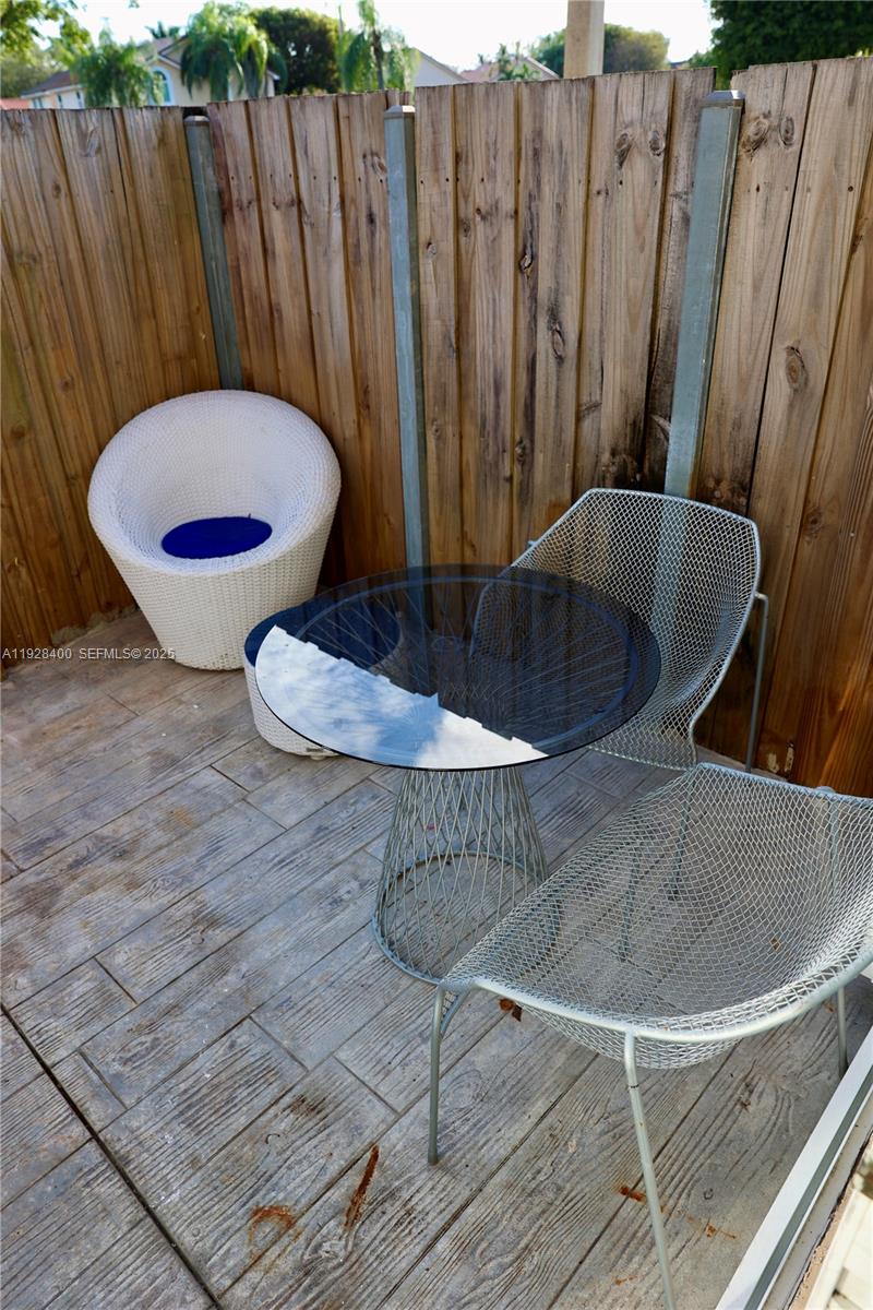 11049 Southwest 152nd Court Miami, FL 33196 - Photo 52 of 57 a view of a room with wooden floor