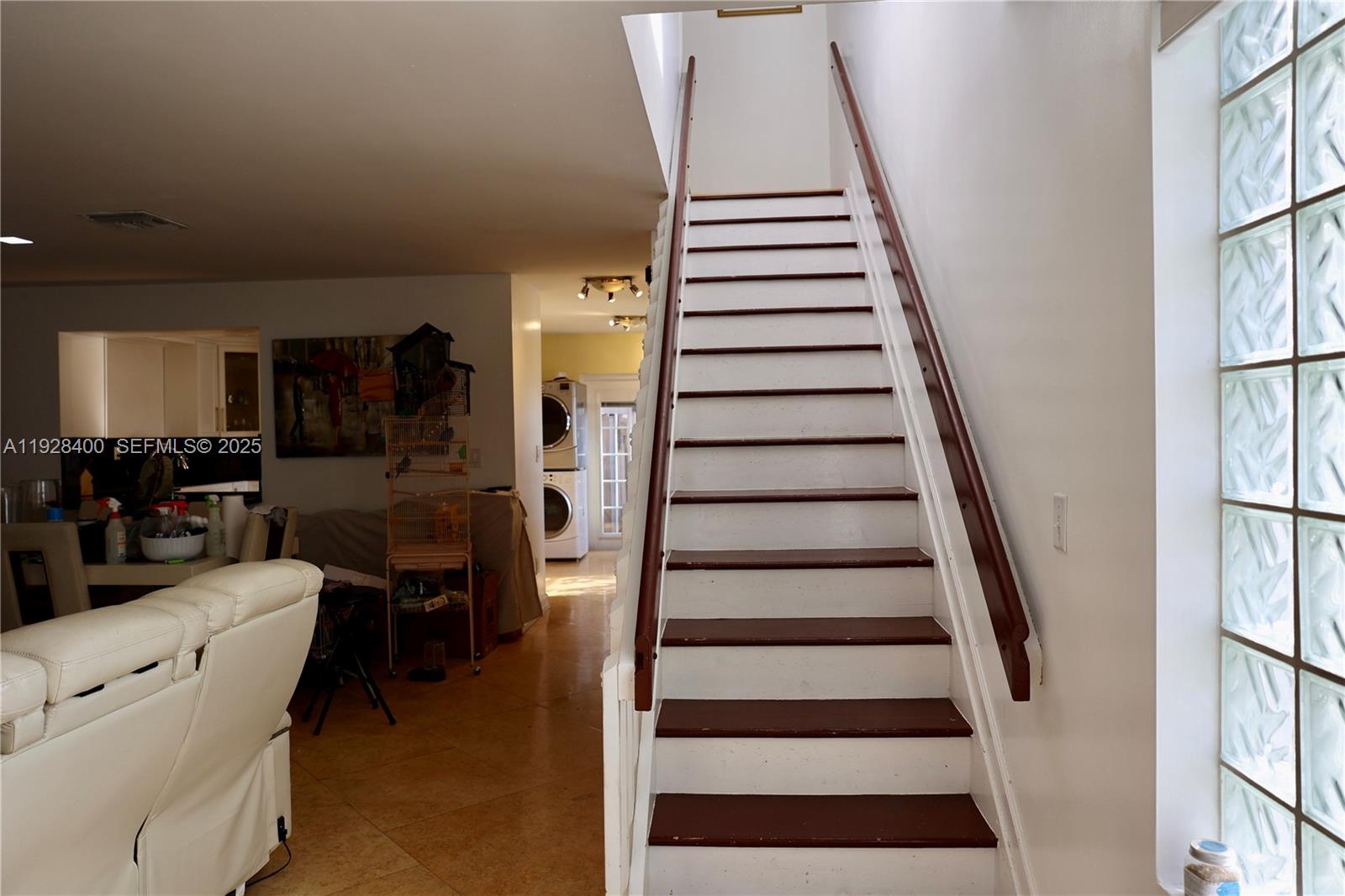 11049 Southwest 152nd Court Miami, FL 33196 - Photo 6 of 57 a view of entryway and hall with wooden floor