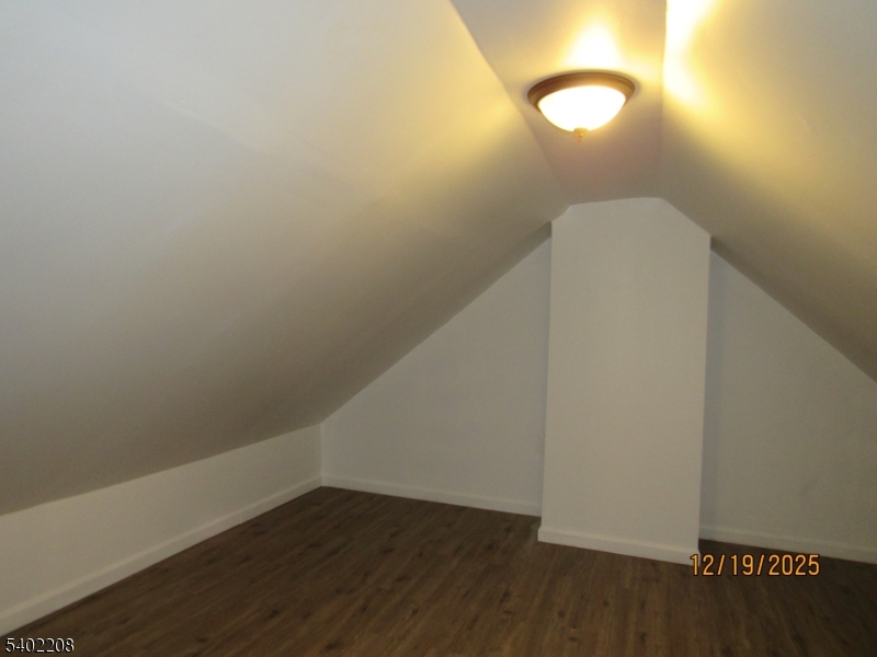 552 Milford Frenchtown Road Milford, NJ 08848 - Photo 21 of 26 a view of a room with wooden floor and white walls