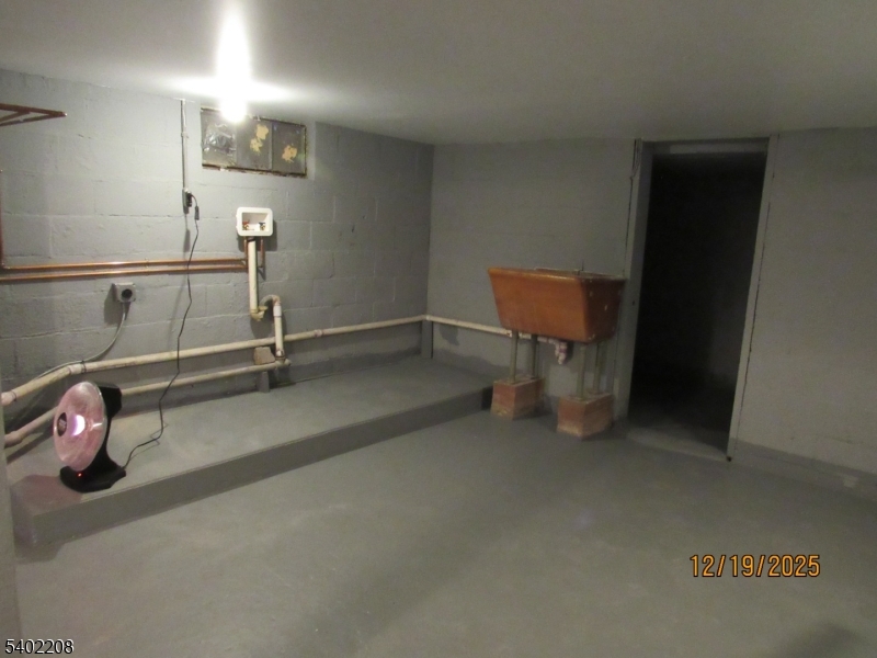 552 Milford Frenchtown Road Milford, NJ 08848 - Photo 25 of 26 a room with gym equipment and a table