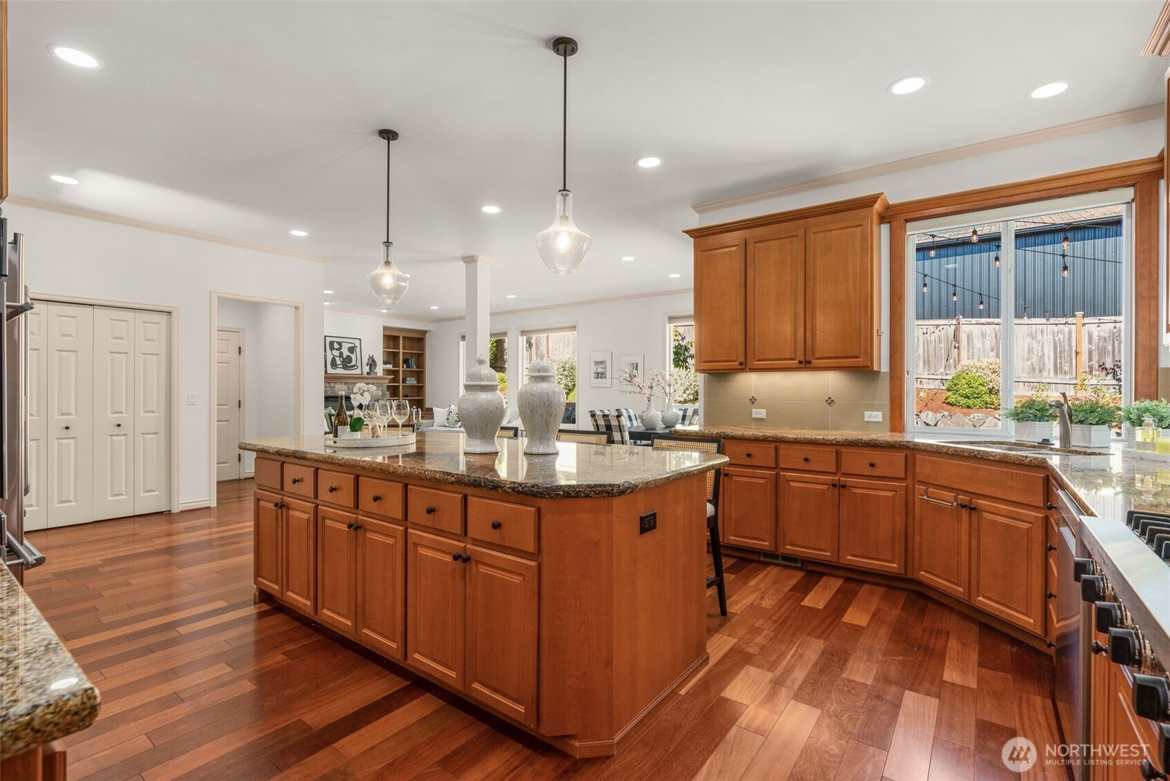 2022 240th Place Southeast Bothell, WA 98021 - Photo 18 of 40 a large kitchen with kitchen island granite countertop a large island in the center