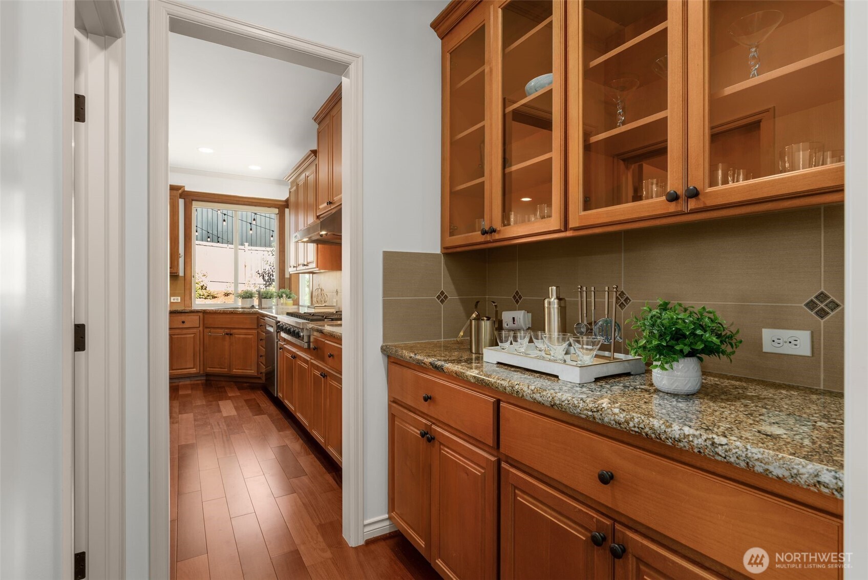 2022 240th Place Southeast Bothell, WA 98021 - Photo 20 of 40 a kitchen with granite countertop a oven a sink a counter space and cabinets