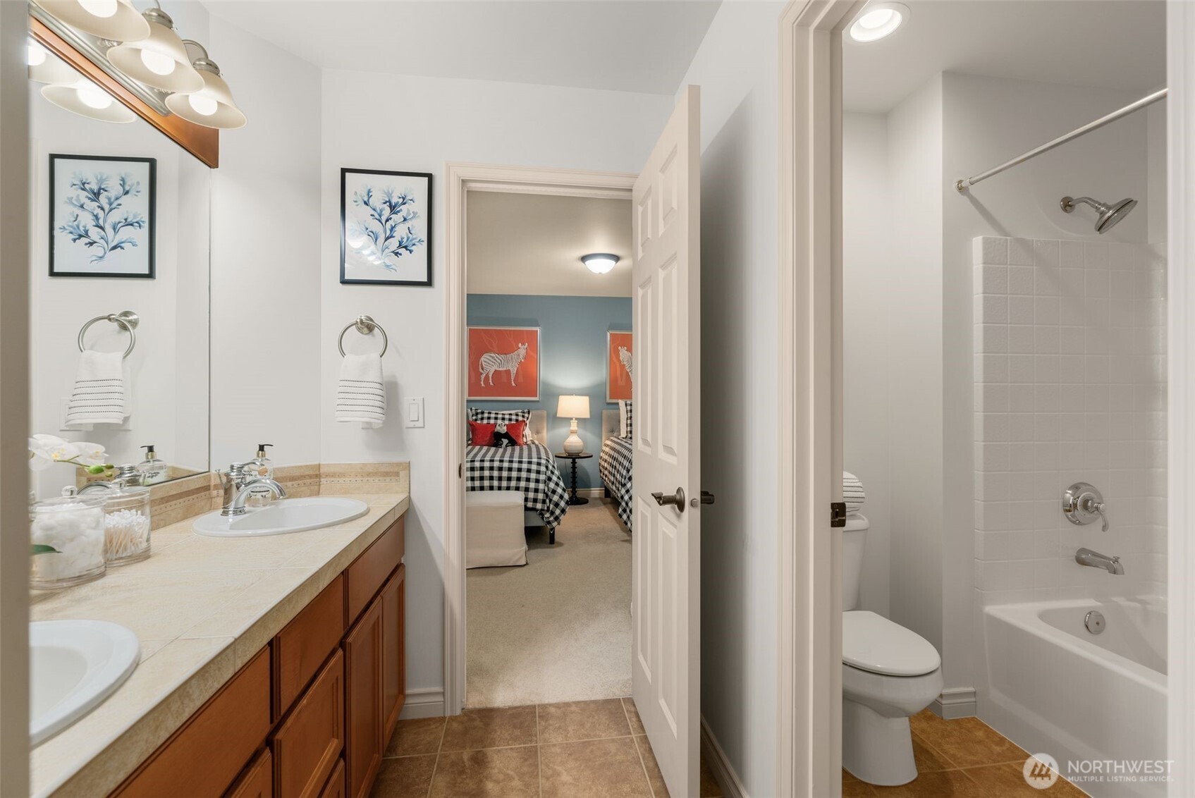 2022 240th Place Southeast Bothell, WA 98021 - Photo 22 of 40 a bathroom with a sink toilet tub and shower