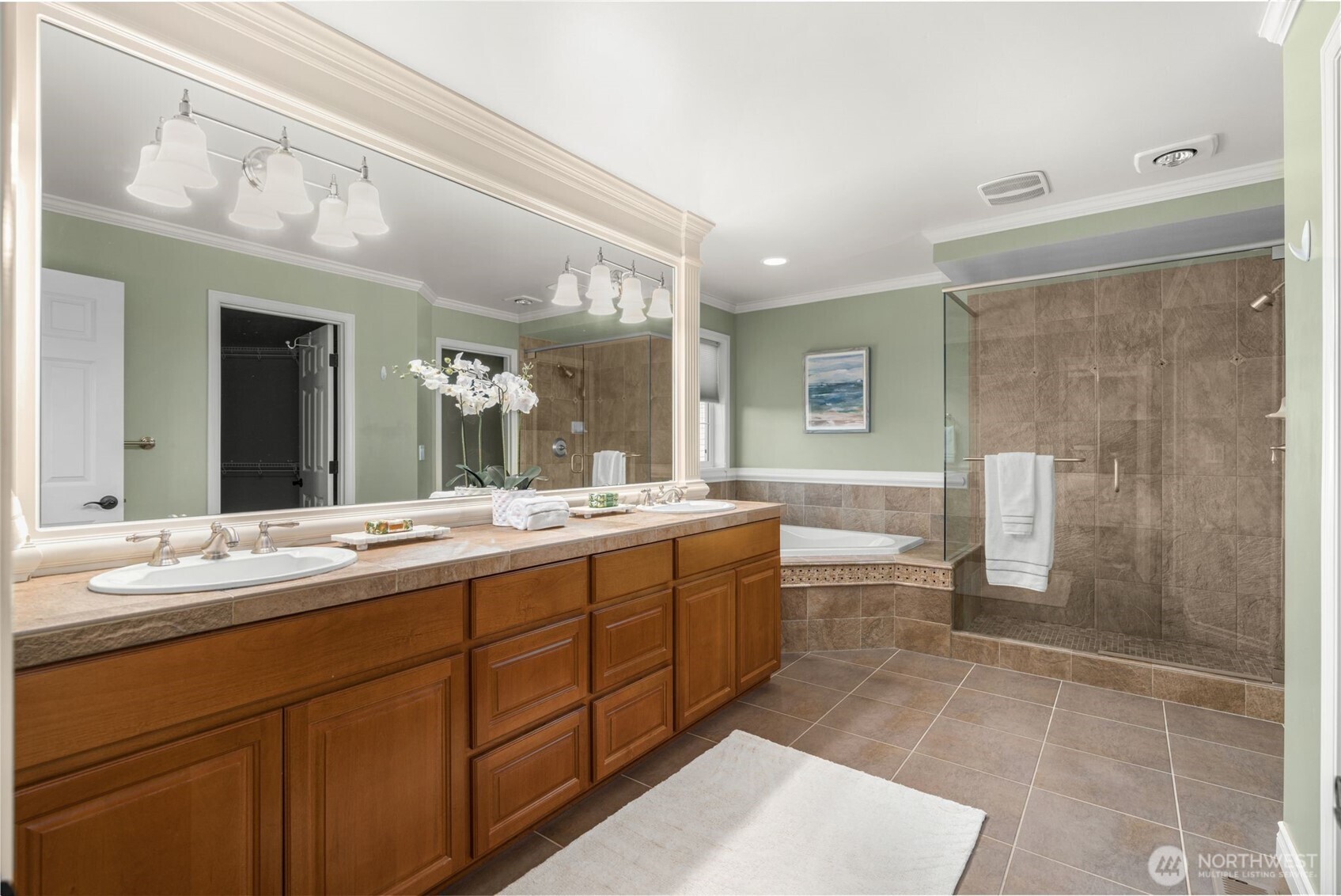 2022 240th Place Southeast Bothell, WA 98021 - Photo 30 of 40 a bathroom with a double vanity sink mirror and toilet