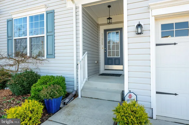 a view of a door of the house and front door