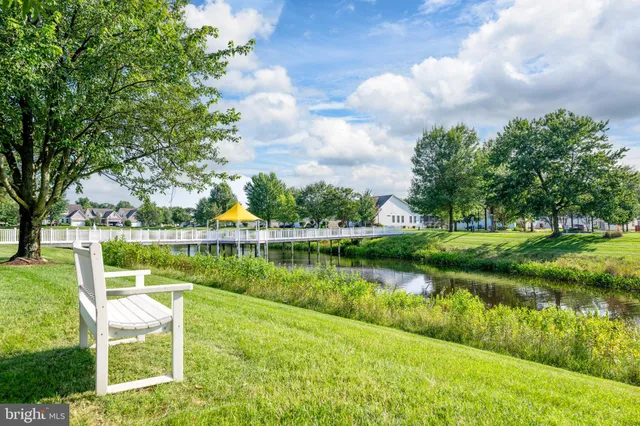 a view of a lake with a garden and lake view