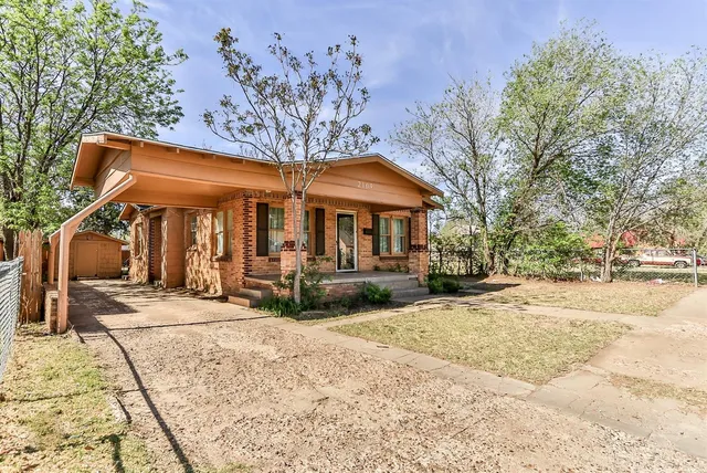 a front view of a house with a patio