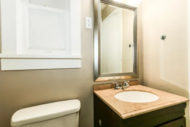 a bathroom with a sink and a toilet