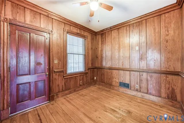 a view of entryway with wooden floor